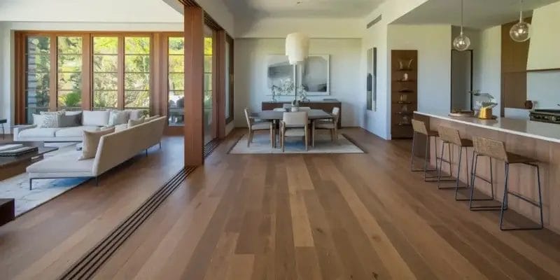 open concept home wide plank wood flooring